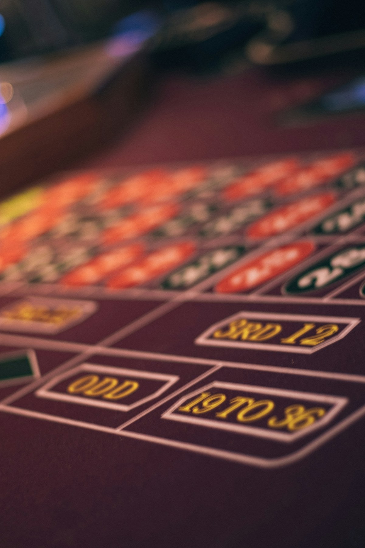 A close, shallow-focus view of the numbers on a roulette layout.